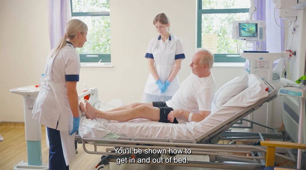 nhs video of patient being helped out of bed