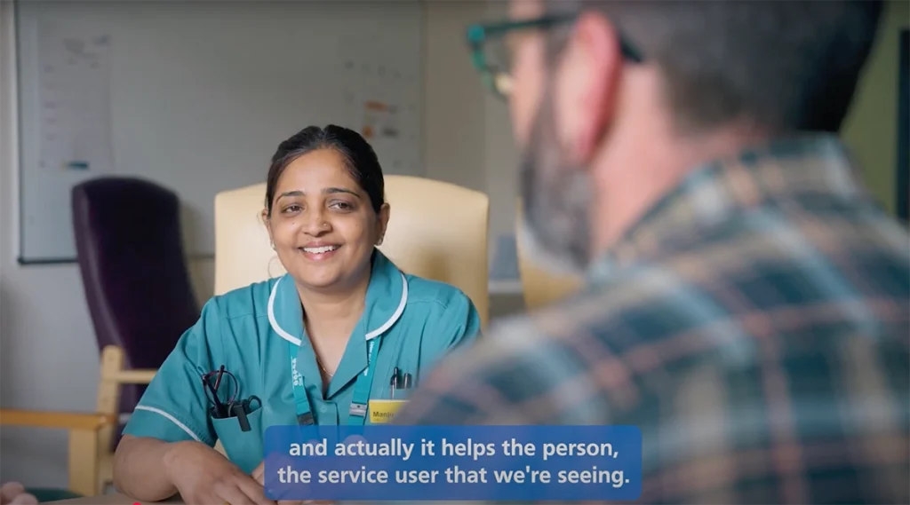 nurse talking to a patient