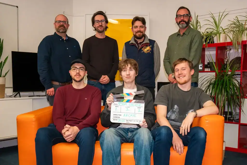 college student intern with inspired film crew