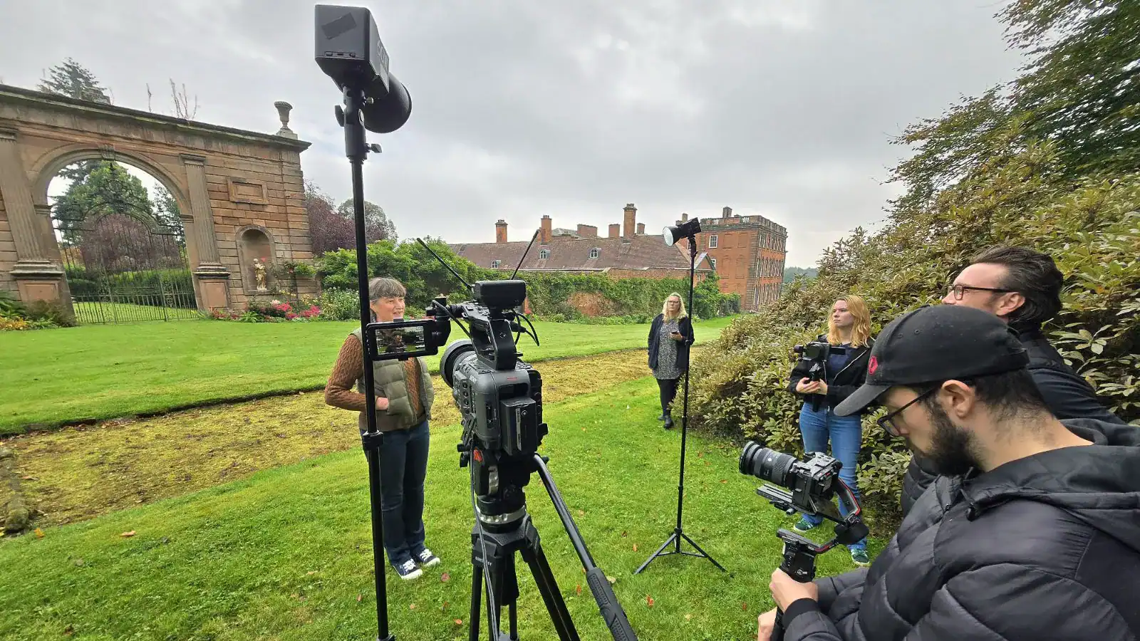 Film crew filming outdoors at Chillington Hall Estate in England for Screen Staffordshire